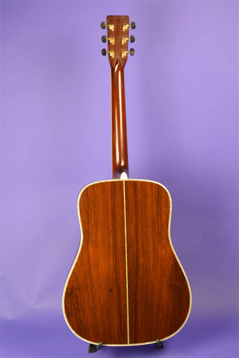 -One shallow dent below pickguard appx 2" long. . Brazilian rosewood martin guitar
